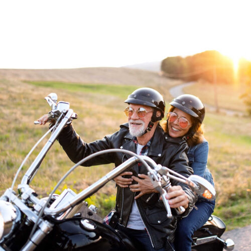 Image of a couple enjoying a motorcycle ride